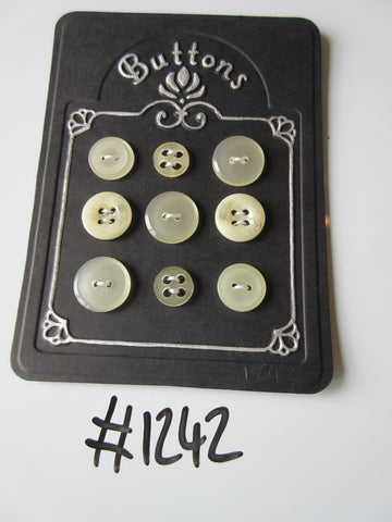 No.1242 Lot of 9 Cream Clear Buttons