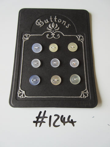 No.1244 Lot of 9 Clear Buttons