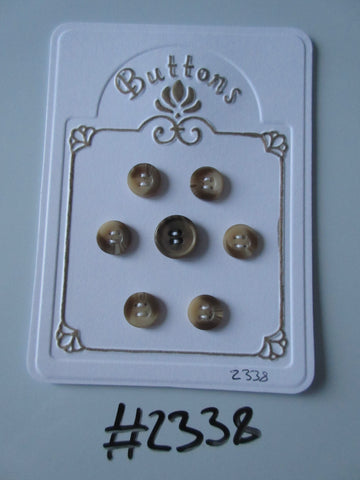 #2338 Lot of 7 Beige Buttons
