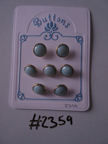#2359 Lot of 7 Pale Blue with Gold Colour Surround Buttons