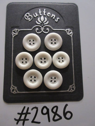 #2986 Lot of 7 White Buttons