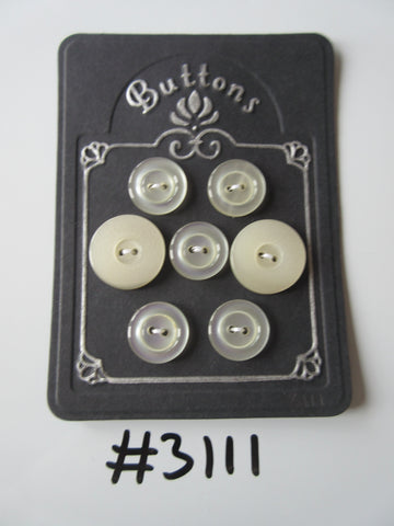 #3111 Lot of 7 Cream Buttons