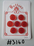 #3140 Lot of 7 Orange Buttons