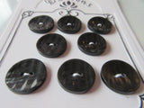 #3156 Lot of 8 Dark Grey Textured Buttons
