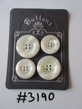 #3190 Lot of 4 Cream Swirl Buttons