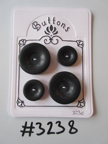 #3238 Lot of 4 Chunky Black Buttons